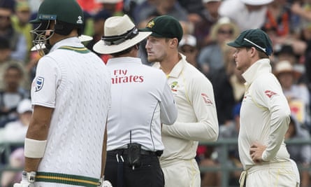 Cameron Bancroft talks to the umpire during the ball-tampering incident during the third Test between South Africa and Australia in Cape Town.