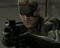 Old Snake, an older man with a headband and eyepatch, points a gun.