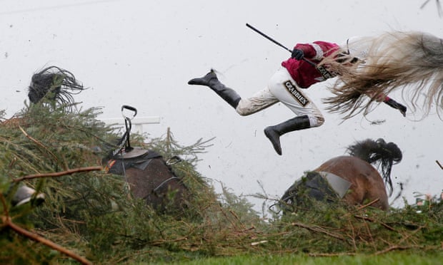 Jockey Nina Carberry flies off her horse Sir Des Champs during the Grand National steeplechase