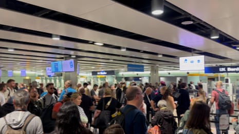 'Nothing ever works': UK passengers delayed at airport passport control after e-gates fail – video