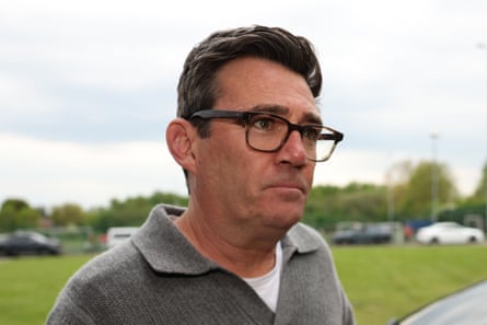 Andy Burnham arrives at a football ground