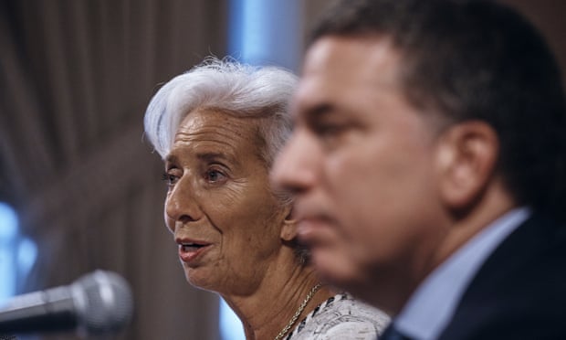 Argentina’s treasury minister Nicolás Dujovne, right, listens as the IMF managing director, Christine Lagarde, left, speaks.