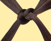 A knot made up of thick strands of healthy-looking brown hair