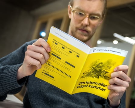 Man with yellow book