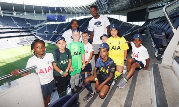 Ryan Sessegnon, pictured at Tottenham Hotspur Stadium, with some of the youngsters who attended Summer of Spurs, a free activity programme being delivered by the Club throughout August to keep local young people engaged during the school holidays.