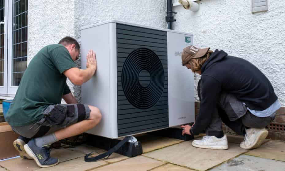 Air source heat pump installers from Solaris Energy installing a Vaillant Arotherm plus 7kw air source heat pump unit