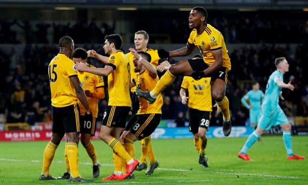 Willy Boly celebrates the late equaliser for Wolves.