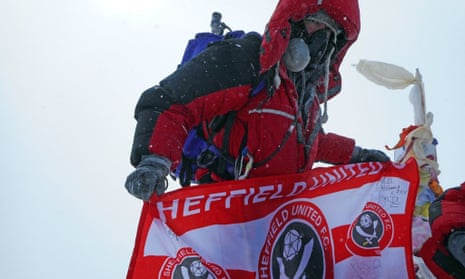 Ian Toothill with the Sheffield United flag on Everest
