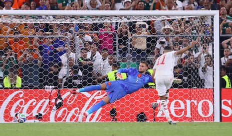 Morocco's Ismael Saibari scores a penalty during the penalty shoot-out to win the match.