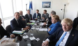 President Emmanuel Macron of France meets with the German chancellor, Angela Merkel, and Britain’s prime minister, Boris Johnson, at the United Nations headquarters in New York on Monday.