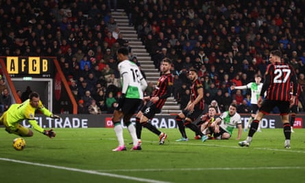 Diogo Jota (grounded) scores Liverpool’s third goal.