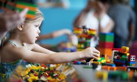 child playing with lego