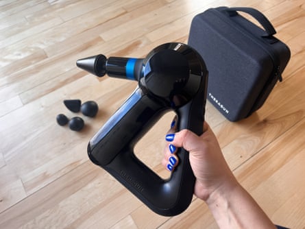 A Theragun Elite Bluetooth Massage Gun