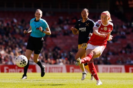 Arsenal's Chloe Kelly slots home her first of two goals against West Ham