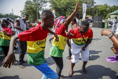 Ghana fans over at a screening in the capital Accra, join in the celebrations.