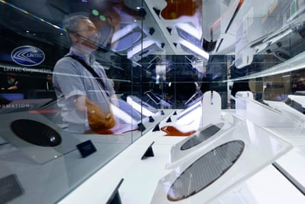 Visitors inspect various silicon wafers on display in Taiwan.