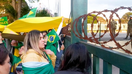 'Brazil was stolen': the Bolsonaro supporters who refuse to accept election result – video