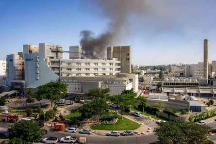 Smoke billowing from a building complex
