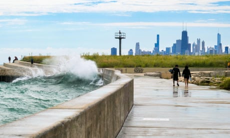 Waves crashing over the seawall at Montrose Point, Chicagio, Illinois.<br>2KENK59 Waves crashing over the seawall at Montrose Point, Chicagio, Illinois.
