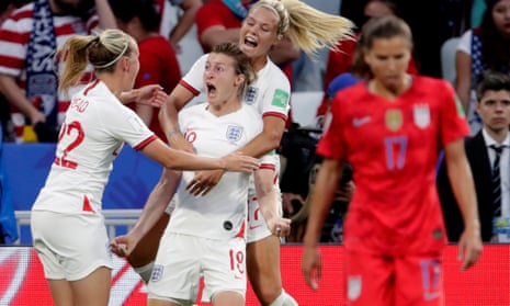 Players celebrate England's goal as US player walks away