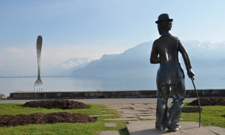 A bronze statue of Charlie Chaplin stares at the Giant Fork in Lake Geneva at Vevey where he lived and died, in Switzerland.