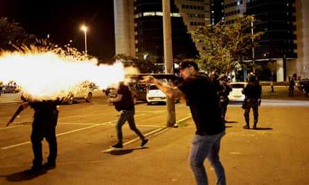 Police clashed with supporters of Jair Bolsonaro in Brasilia on Monday.