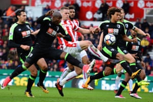 Stoke’s Ryan Shawcross gets between Bournemouth’s Benik Afobe and Nathan Ake of AFC Bournemouth as The Cherries secure a 2-1 away win at the Bet365 Stadium.
