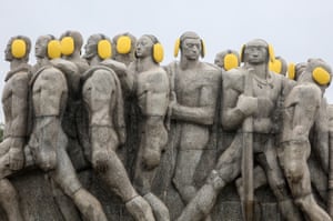 Sao Paulo, Brazil Statues are adorned with ear protectors to mark International Noise Awareness Day, an annual event encouraging people to combat noise pollution