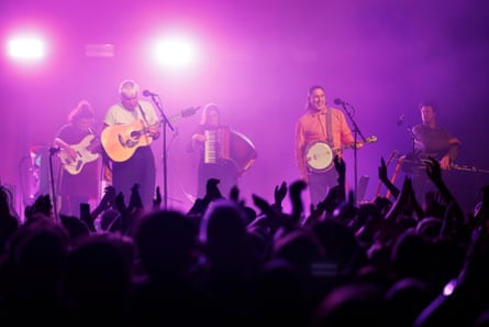 The Mary Wallopers in front of a cheering crowd