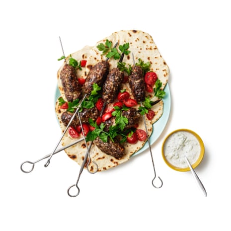 Felicity Cloake’s lamb koftas with the traditional flatbreads, yoghurt sauce and salad.