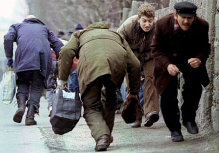 People running for cover from Serbian snipers in Sarajevo in 1993. Ten thousand people were killed during the three-and-a-half-year siege of the city by forces under the command of Ratko Mladic.