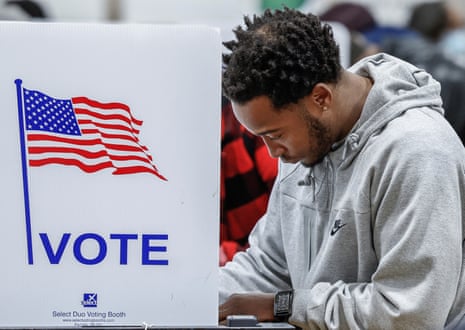 A Michigan voter casts a ballot