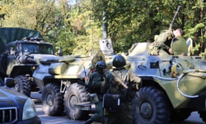 Law enforcement officers at the site of a bomb blast at the college.