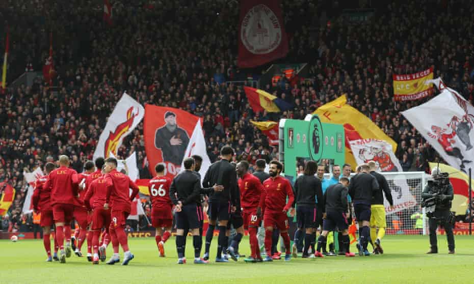 The Liverpool and Bournemouth players great each other without shake hands before their match on 7 March, the last Premier League game at Anfi9eldf in front of fans.
