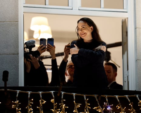 Nobel peace laureate Maria Corina Machado greets supporters from a balcony of the Grand Hotel in Oslo, Norway.