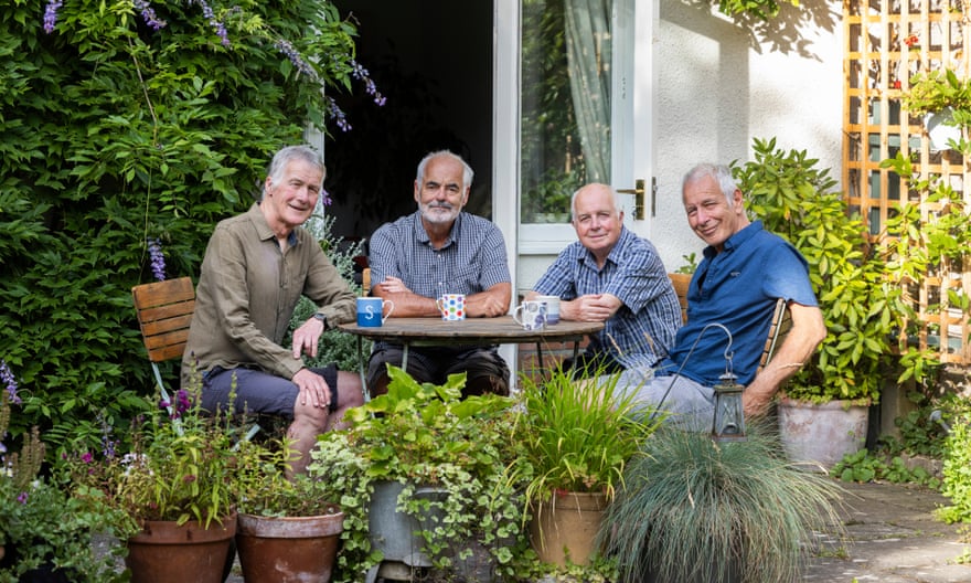 David Spiegelhalter sitting at a garden table with his men’s group