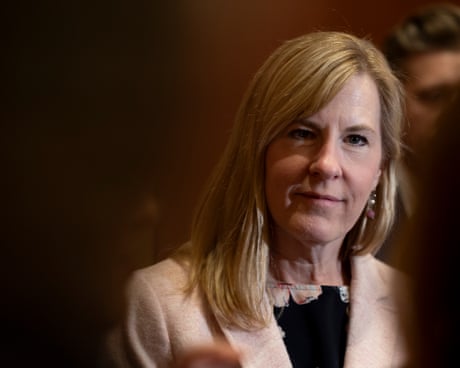 a women looking at a camera