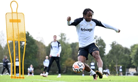 Raheem Sterling takes a shot during training.