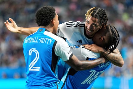 Charlotte FC forward Idan Toklomati, center, celebrates his goal with defender Jahkeele Marshall-Rutty (2) and forward Kerwin Vargas (18) during the first half of an MLS soccer match against Inter Miami, Saturday, Sept. 13, 2025, in Charlotte, N.C.