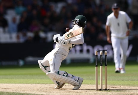 Pakistan's Imam-ul-Haq hits a shot and is caught out by England's Jamie Smith off the bowling of England's Jofra Archer.