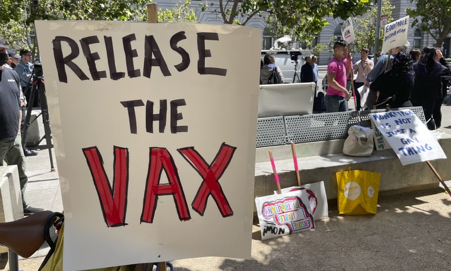 Sign says ‘release the vax’