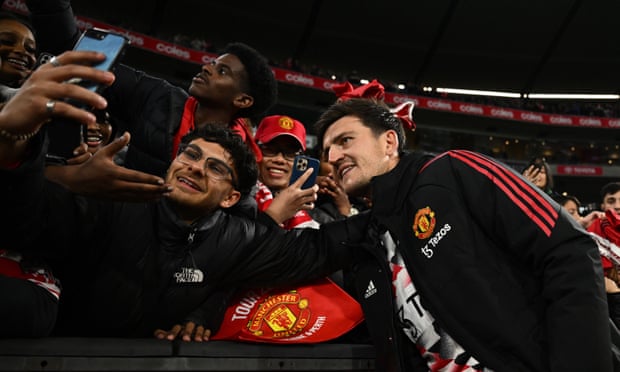 Manchester United’s Harry Maguire with fans at Melbourne Cricket Ground.