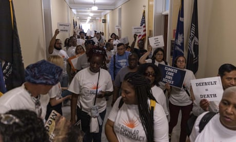 Protesters in Congress demand Democrats fight Republican attempts to cut vital programs as part of a debt ceiling deal.