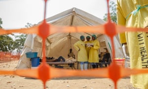 Medical staff give treatment to people suffering from cholera at the medical camp.