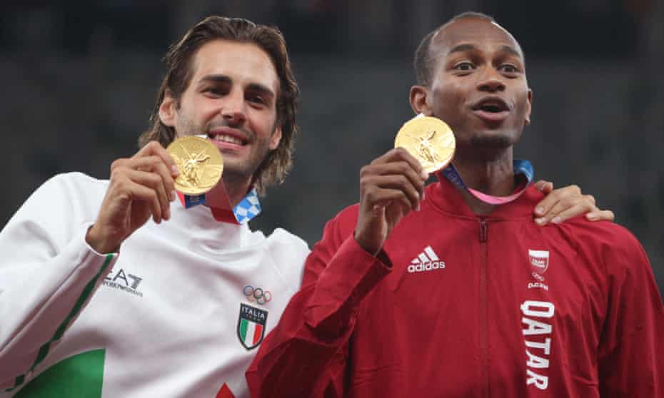 Joint gold medallists Gianmarco Tamberi (left) and Mutaz Barshim on the podium in Tokyo.