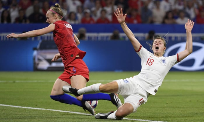England’s Ellen White goes down after the challenge of Becky Sauerbrunn.
