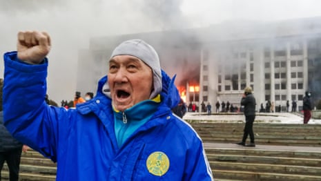 Kazakhstan protests: demonstrators storm government buildings – video