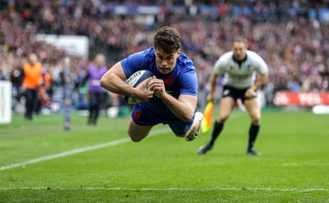 France's Damian Penaud scores their first try.