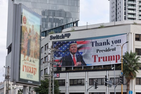 A billboard displays an image of US president Donald Trump with a message thanking him for reaching a ceasefire deal in Gaza, on the side of a building in Tel Aviv’s Hostage Square.