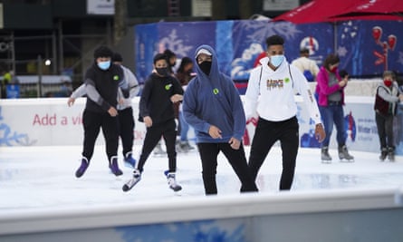 People skate in the ice rink at Bryant Park in New York, 6 November 2020.